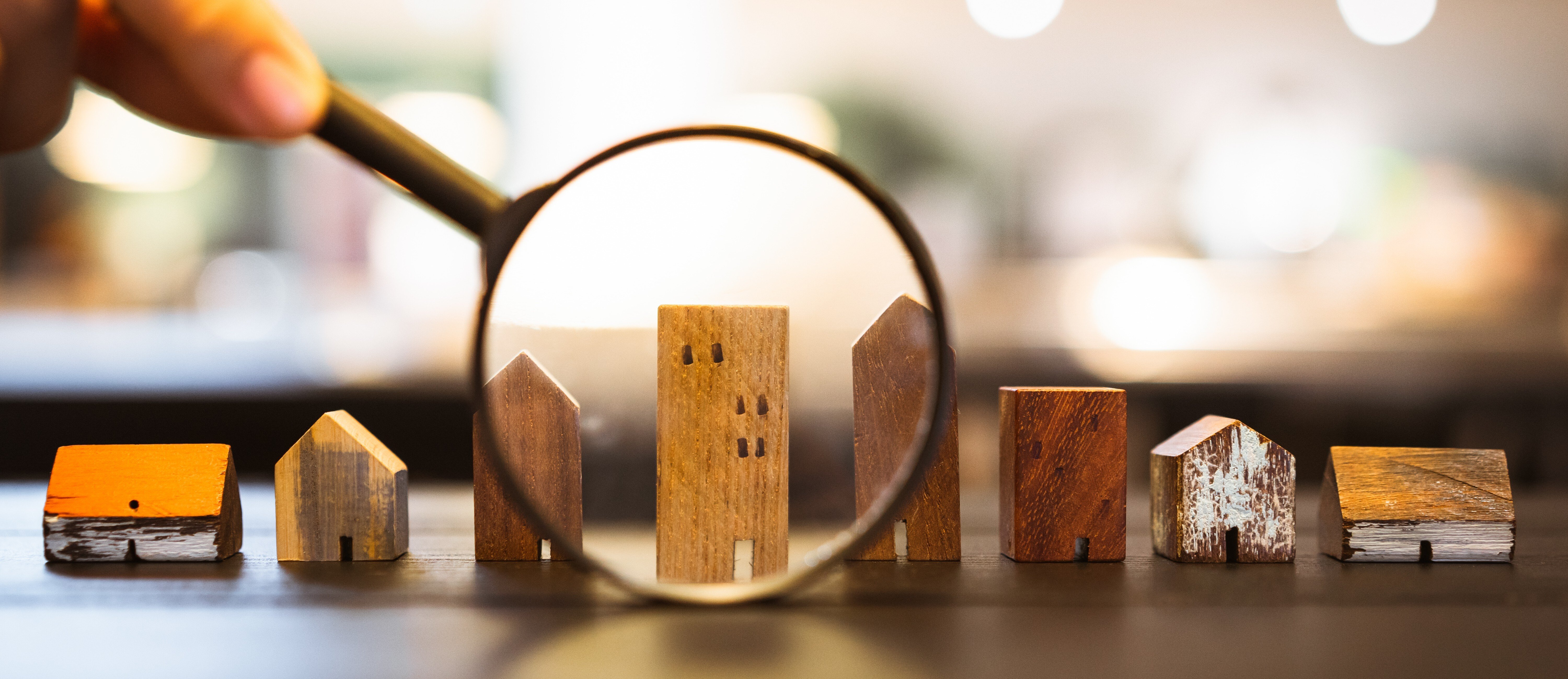 building under magnifying glass